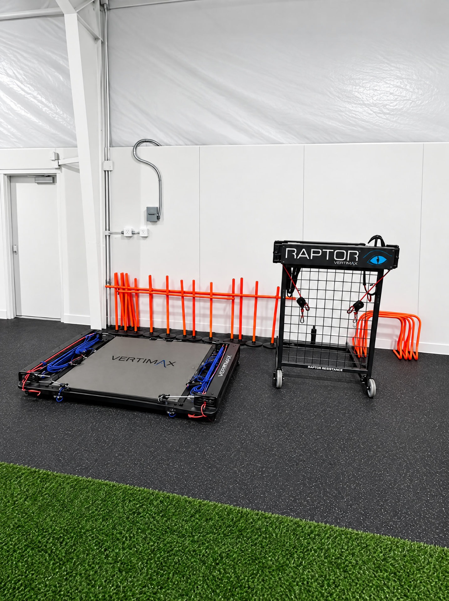 VertiMax resistance training platforms beside the indoor turf at THE R
