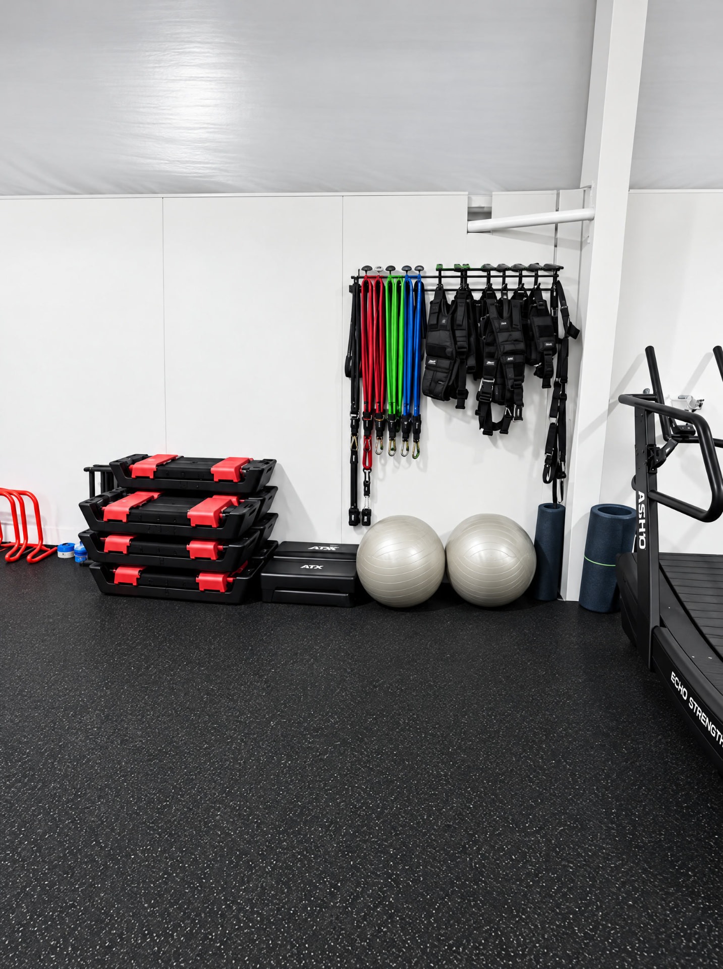 Resistance bands, stacked steps, and exercise balls at THE R